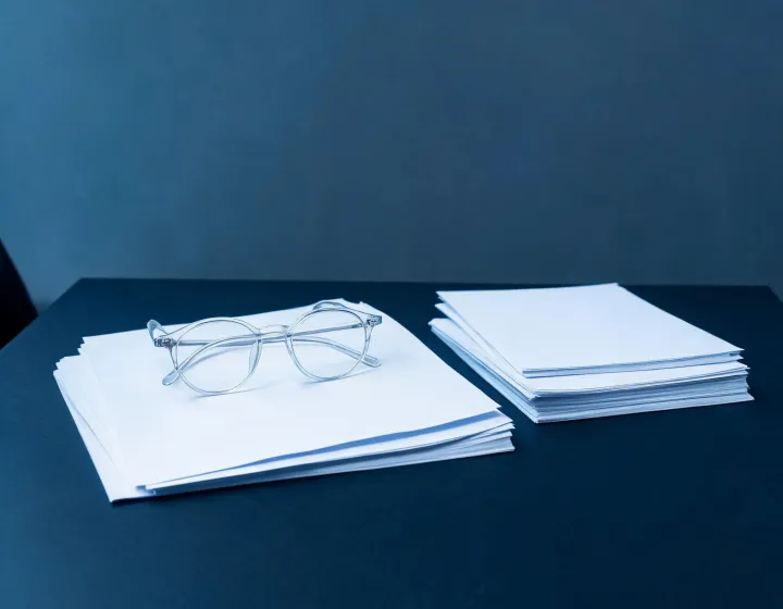 Independent sourcing desk reviewing round frames briefs